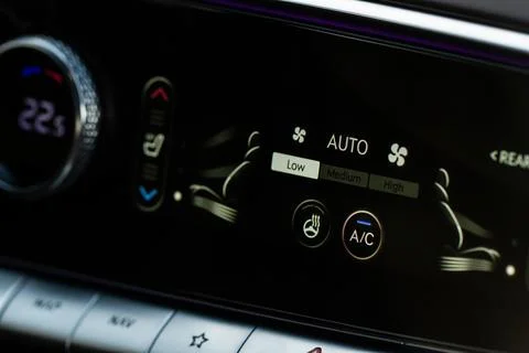 Digital control panel car air conditioner dashboard. Modern car interior cond Stock Photos