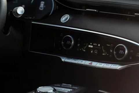 Digital control panel car air conditioner dashboard. Modern car interior cond Stock Photos