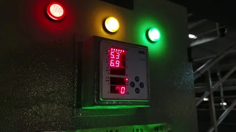 Digital Control Panel Display with Multicolored Indicator Lights at Night Stock Footage 311515195