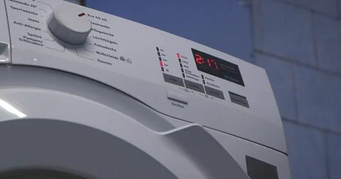 Digital Control Panel of Modern Washing Machine Stock Photos