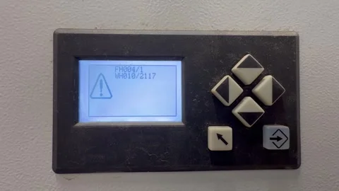 Digital control panel with six buttons and red error light flashing on display Stock Footage 345995426