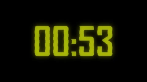 Digital countdown clock on dark background showing neon yellow numbers with.. Stock Footage 329145165