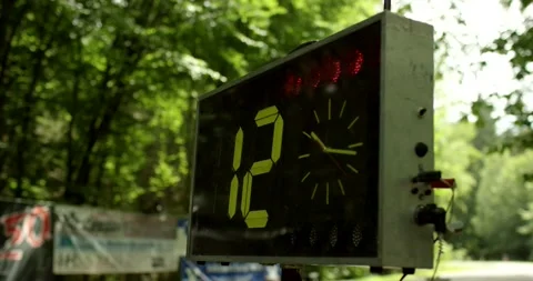 Digital Countdown Display Ticks Down at a Forest Rally Stage Stock Footage 340261264