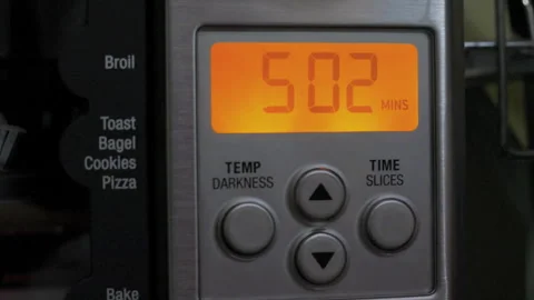 Digital Countdown on Oven While Baking Cupcakes Stock Footage 315095508