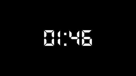 Digital countdown timer clock with white led seven-segment display on black.. Видео 334701085