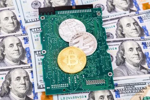 Digital cryptocurrency bitcoin, electronic computer component and american do Stock Photos
