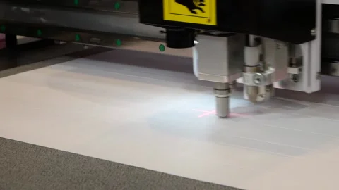 The digital cutting plotter produces cardboard products. Stock Footage 190449322