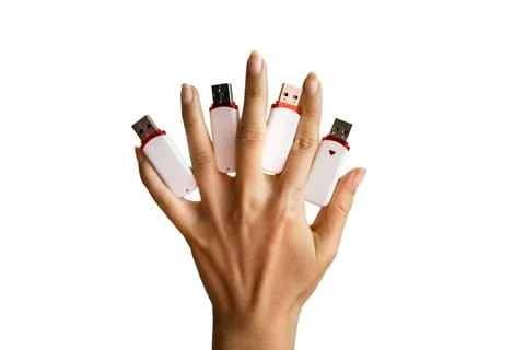Digital data memory concept. Hand holding many pendrive on white background. Stock Photos