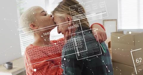 Digital data processing image over two people embracing in cozy room Stock Photos