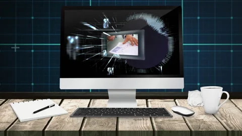 Digital data processing over computer screen with documents on wooden desk Stock Footage 311036623