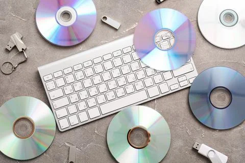 Digital data storage devices with keyboard, USB flash drives, and cds for inf Stock Photos