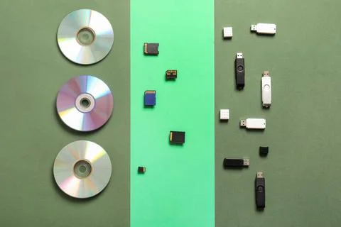 Digital data storage evolution: cds, memory cards, and USB flash drives on gr 库存照片