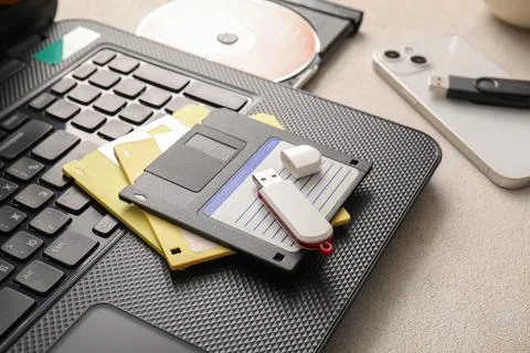 Digital data storage evolution: floppy disks, USB flash drive, CD-ROM, smartp Stock Photos