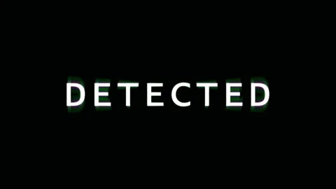 Digital detection alert glowing on black background with cinematic motion a.. Video stock 343478620