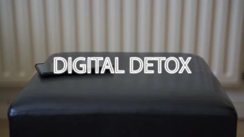 Digital detox blinking with black smartphone Video stock 132350416