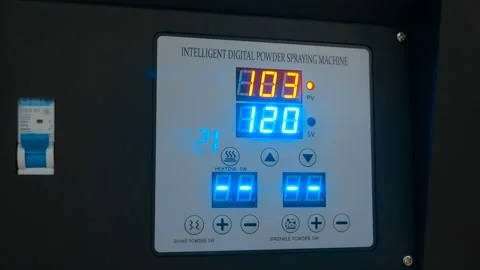 Digital display with changing digits on the panel of industrial equipment functi Stock Footage 217669132