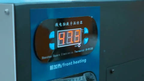 Digital display with changing digits on the panel of industrial equipment  Stock Footage 217685869