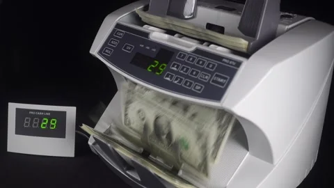 The Digital Display Of The Counting Machine Shows The Number Of Banknotes. Video stock 322521254