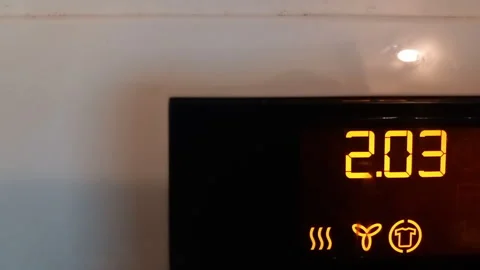 Digital display of electric dryer shows startup sounds and program selection in  Stock Footage 322575389