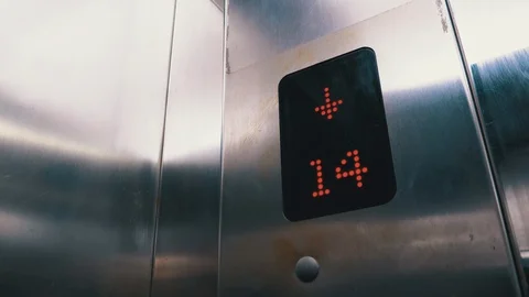 Digital Display in the Elevator with Arrow Down Shows Floors from 15st to 7th Stock Footage 119370799