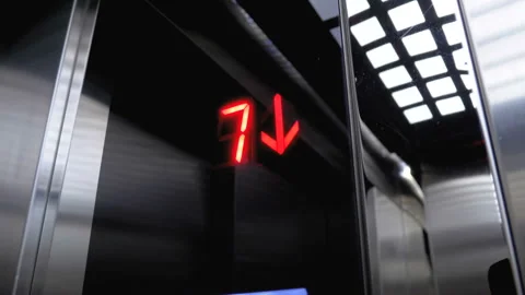 Digital display in the elevator which descends from the floor with an arrow down Stock Footage 97842343