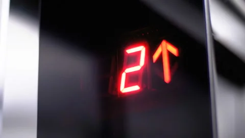 Digital display in the elevator which rises up on floor with an arrow up Stock Footage 97855640