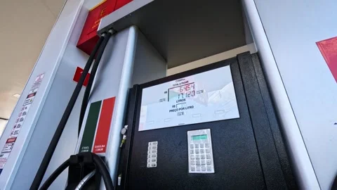 Digital display of a fuel pump tracking price and liters Stock Footage 337791770