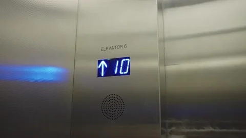 Digital display inside elevator going up building floor Stock Footage 225596556
