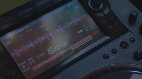 Digital display of a mixer while playing song at nightclub Stock Footage 87153975