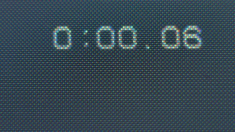 Digital display, Numbers changing, Time VHS. Video stock 133447540