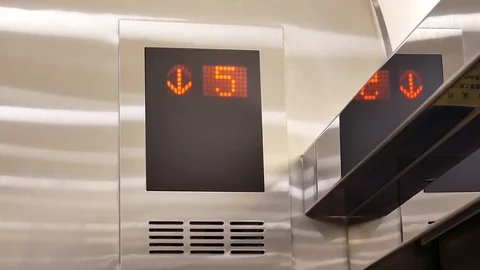 Digital display showing floor number inside elevator go down to main floor Video stock 83493599