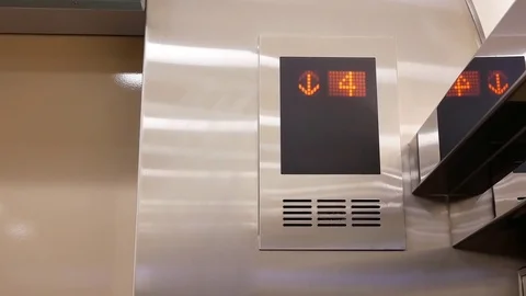 Digital display showing floor number inside elevator go down to main floor Video stock 83665256