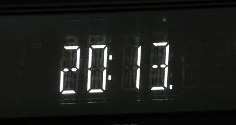 Digital Display Showing the time on a Dark Background Stock Photos