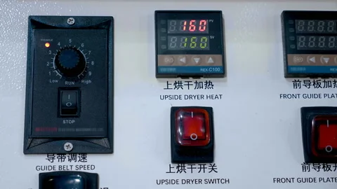 Digital display, various switches and controls on panel of industrial equipment Stock Footage 217685820