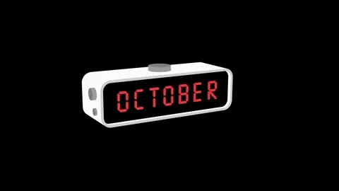 Digital display with word October in red on black screen Stock Footage 314314737