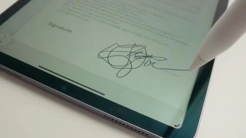 Digital Document Signing Process with Electronic Signature on Tablet Stock Photos