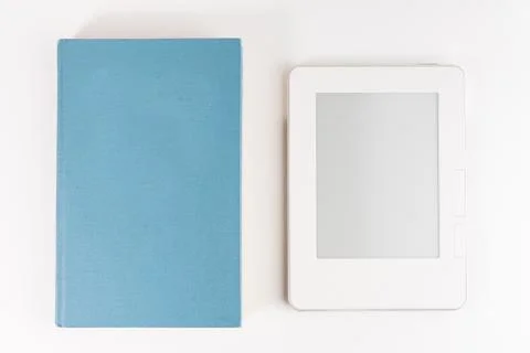 Digital e-book reader with a blank screen owith old paper book, isolated on w Stock Photos