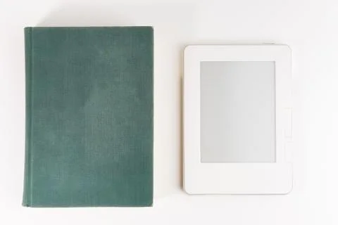 Digital e-book reader with a blank screen with old paper book isolated on whi Stock Photos
