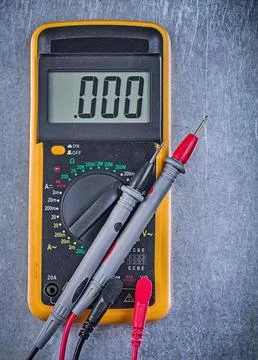 Digital electrical tester wires test leads on a metallic background Stock Photos