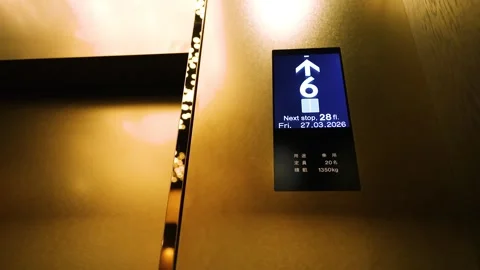 Digital elevator display panel showing floor numbers rising in modern skysc.. Stock Footage 333091239