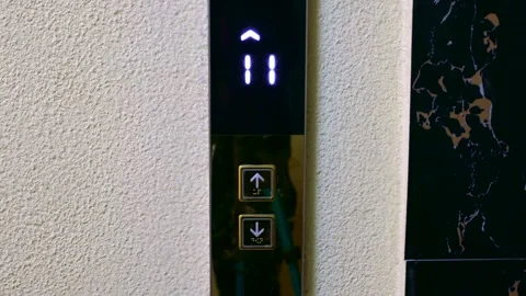 Digital elevator display showing white floor number. Lift going up Stock Footage 265246817