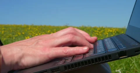 Digital Field Office: A person's hand swiftly navigates a laptop keyboard Vídeo Stock 333232982