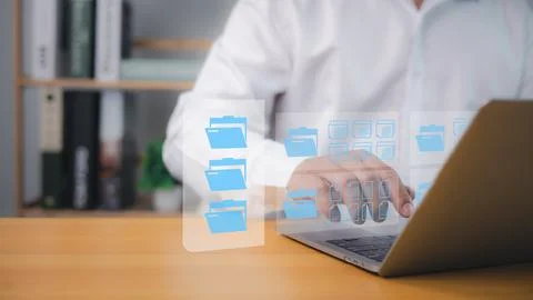 Digital file document management on laptop by professional using cloud comp.. Stock Photos