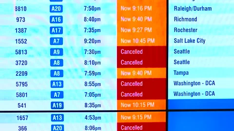 Digital Flight Board Showing Delayed and Cancelled Departures Stock Footage 316819201