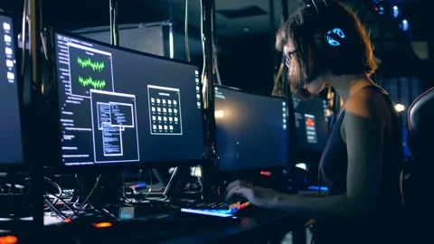 Digital fraudster cracking a code, side view. Cyber crime and hacking concept. Stock Footage 102021220