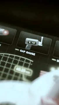 Digital gap gauge shows clear 0.18 value Stock Photos