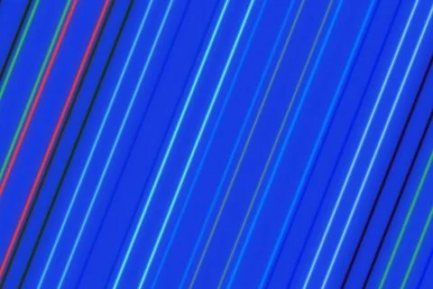Digital glitch pattern with colorful lines on blue background Stock Photos