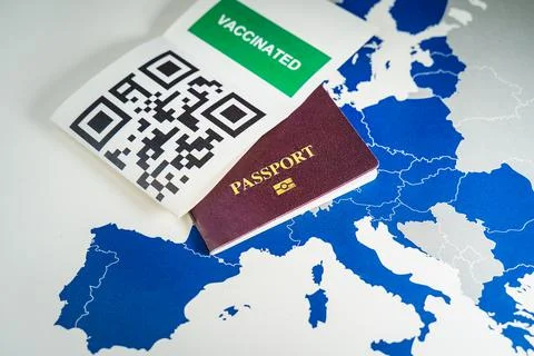 Digital green passport with QR code over an EU map Foto stock