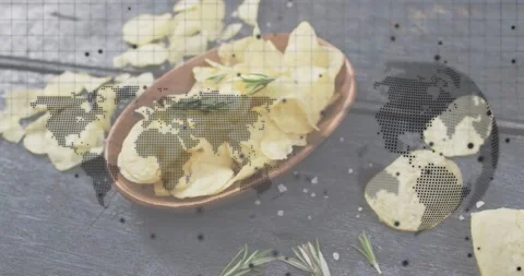 Digital grid fading over copper bowl of potato chips, data points pulsing Stock Footage 317792183