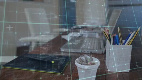 Digital grid overlay starting camera zoom, revealing laptop tablet plant pencil 動画素材 313307757